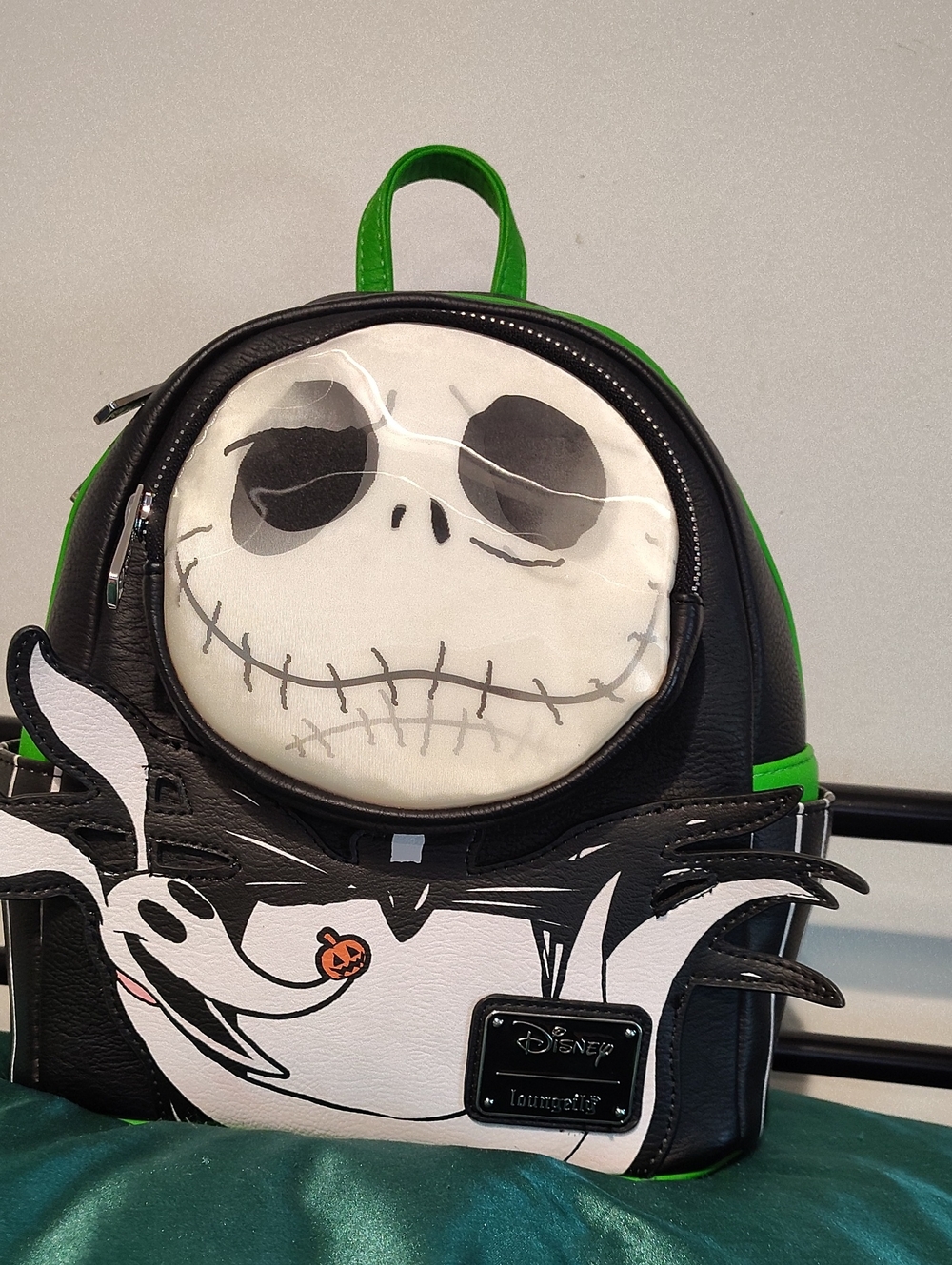 This is a Loungefly Disney Parks Nightmare Before Christmas mini backpack